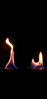 Elegant black wallpaper with glowing flames.