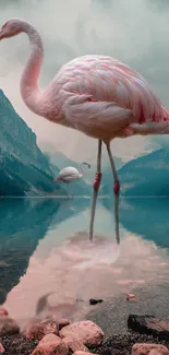 Flamingo stands gracefully in a tranquil lake with mountain backdrop.