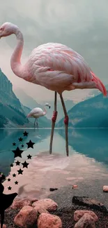 Flamingo standing in turquoise lake, surrounded by mountains.