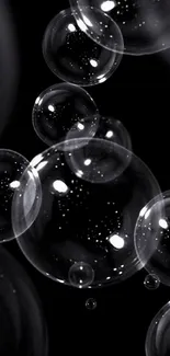 Black background with floating transparent bubbles.