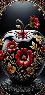 Black apple with ornate floral design featuring red flowers and gold leaves.