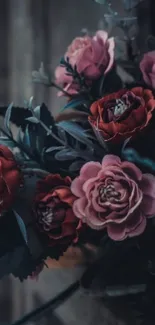Elegant floral arrangement with roses in rich hues.