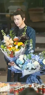 Asian figure with floral bouquets in traditional attire.