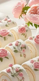 Elegant floral cake rolls with pink roses