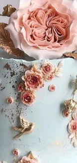 Elegant pastel blue cake with floral decorations.