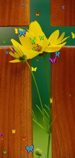 Yellow flowers tucked into a wooden cross design.