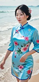 Woman in floral dress walking along the beach with ocean waves in the background.