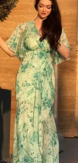 Woman in flowing floral dress outside