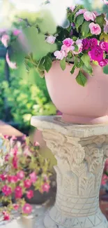 Vibrant pink flowers in an elegant stone pot in a serene garden.