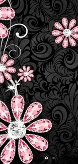 Elegant floral wallpaper with pink gems on black background.