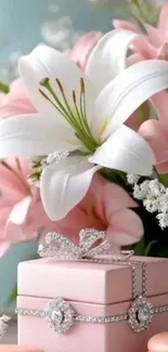 Elegant pink gift box with white lilies.