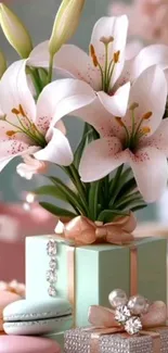 White lilies on pastel gift boxes with soft decor accents.
