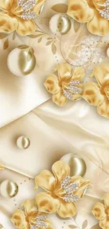 Elegant gold floral wallpaper with pearls and satin texture.