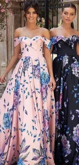 Two women in floral off-shoulder gowns, one pink and one black, standing elegantly.