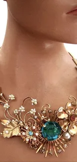 An artistic floral necklace with golden tones and intricate details.