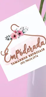 Elegant floral logo on a pink background wallpaper.