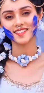 Model with floral jewelry and blue makeup for mobile wallpaper.