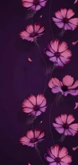 Elegant floral wallpaper with pink flowers on a dark purple background.