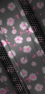 Elegant pink floral pattern on black wallpaper.