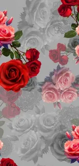 Elegant wallpaper with red and pink roses on a gray background.