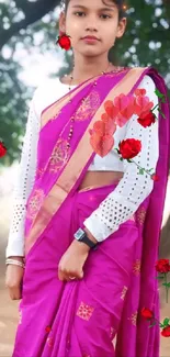 Young girl in magenta sari with floral accents