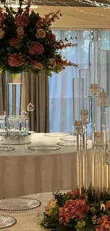 Elegant table with pink floral arrangements in a luxurious setting.