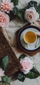 Elegant tea cup surrounded by vintage roses and leaves.