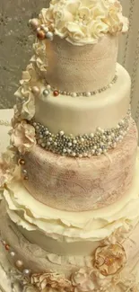 Elegant floral decorated wedding cake with pearls.