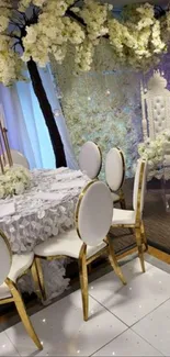 Elegant wedding decor with white flowers and luxurious gold accents.