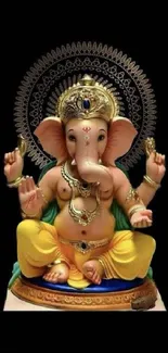 Elegant Lord Ganesha statue wallpaper with vibrant colors and intricate design.