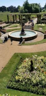 Elegant garden with central fountain and vibrant flower beds.