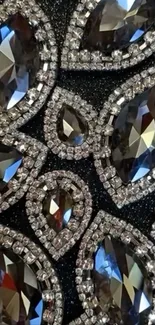 Elegant gemstone pattern with sparkling crystal accents on black background.