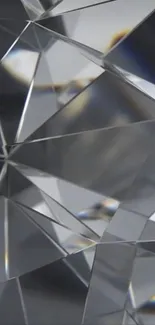 Intricate geometric crystal pattern design in gray.