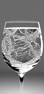 Elegant glass with intricate abstract design.