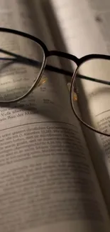 Eyeglasses resting on an open book, creating a vintage and serene ambiance.