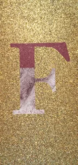 Gold glitter wallpaper with an elegant 'F' design in the center.