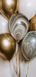 Elegant gold and silver balloons wallpaper.