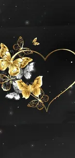 Elegant gold butterflies and heart on black background.