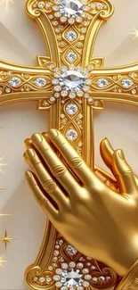 Golden cross with praying hands and sparkling details.
