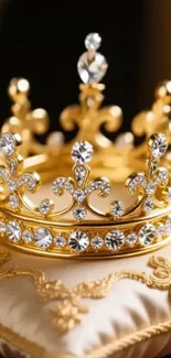 Gold crown with jewels on a pillow.