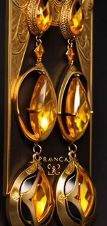Elegant gold earrings against dark background.