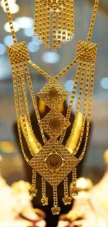 Close-up of elegant gold jewelry with intricate designs.