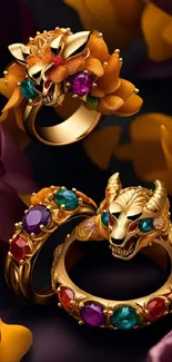 Golden rings with vibrant gemstones and floral designs.