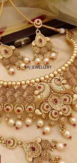 Elegant gold jewelry with intricate design and pearls, perfect for a luxurious wallpaper.