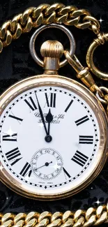 Elegant gold pocket watch on textured black background.