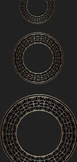 Elegant gold rings on a black background mobile wallpaper.