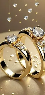 Gold rings with diamonds on a golden background.