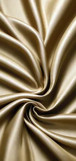 Luxurious golden silk fabric with elegant folds and glossy texture.