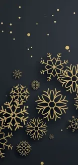 Elegant gold snowflakes on dark gray background wallpaper.