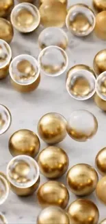 Wallpaper with gold and transparent spheres on a sleek background.